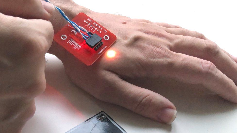 contactless payment chip hand